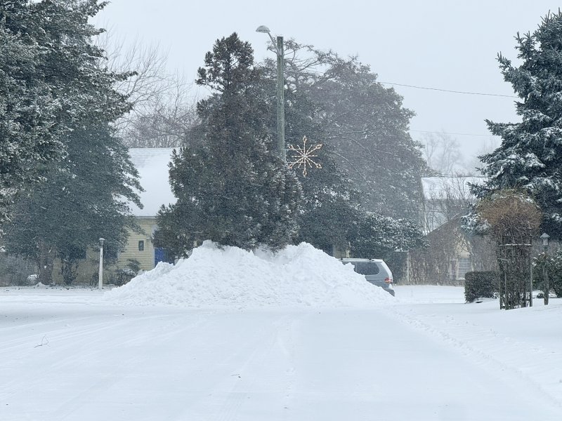 Plowed snow piles up in DeVries Circle in Lewes. NICK ROTH PHOTO