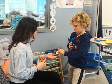 High school student Alyssa Barlow and Ari Rogers make a trade.