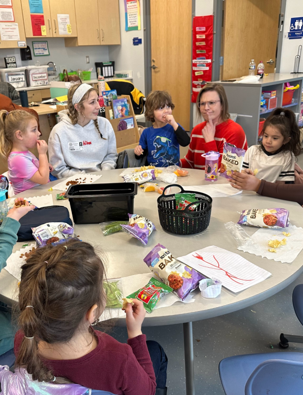 Sharing snacks and chatting are students and teachers (l-r) Ridley Grimm, Hailey Bohan, Tristan Vazquez, Amanda Bogan and Kylie Cendillos Bonilla.