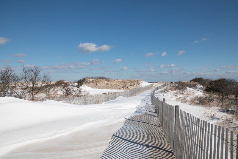With winter weather ahead, including snow in the immediate forecast, the Delaware Department of Natural Resources and Environmental Control reminds residents and visitors that sledding, snowboarding and other recreational activities are not allowed on Delaware’s sand dunes. SUBMITTED PHOTO