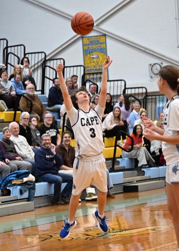 Cape sophomore Xavier Zimmer launches a three-point shot.
