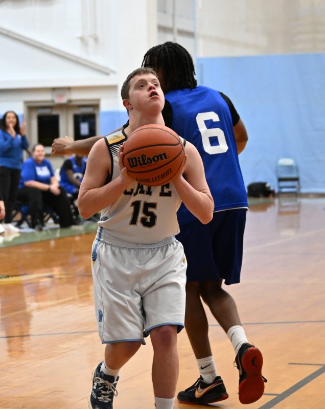 Cape’s Luke Archer gets by the Dover defense for a layup.