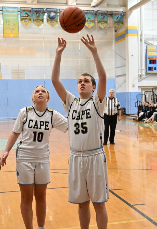 Cape’s Daniel Gartman hits a shot with an assist from unified partner Elizabeth Sprague.