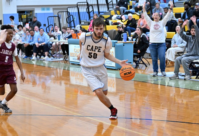 Cape junior Jaxon Benton drives to the hoop.