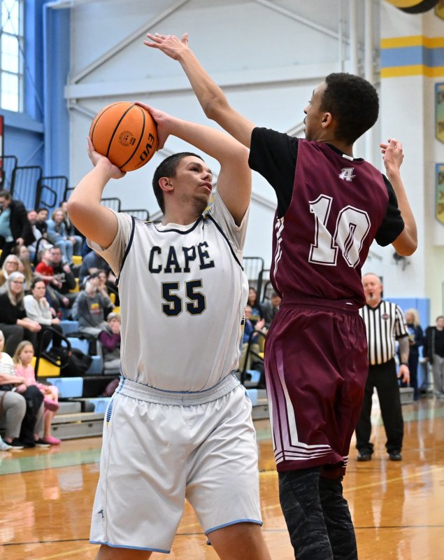 Junior Austin Hastings looks to go up strong on Appo’s Stacy Duker.