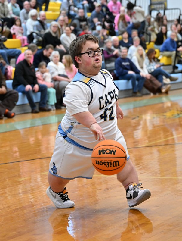 Cape guard Norman Rust drives to the paint.