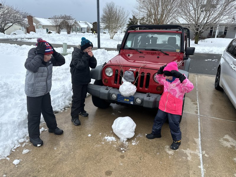 Poor Frosty didn’t stand a chance! Shown (l-r) at the scene of the crime are Joseph Bradshaw, Max Bradshaw and Madison Bradshaw. Photo taken by Trevor Bradshaw.