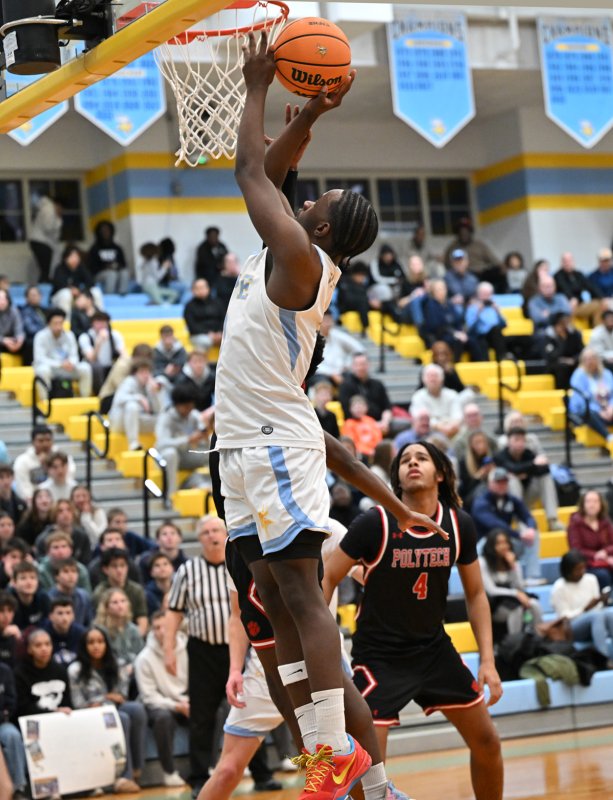 Senior David Barnes hits a deuce in the win over the Panthers. DAN COOK PHOTO