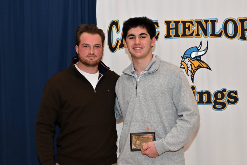 Cape JV coach Ben Ashby presents the JV Sportsmanship Award to Mitchell DiSabatino.