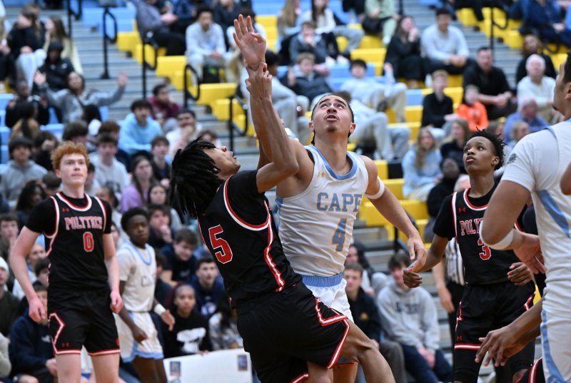 Cape junior Jameson Tingle works for position on the Panthers’ Shane Ward. DAN COOK PHOTO