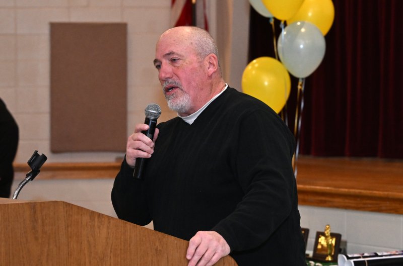 Special teams coach Steve Walsh speaks about his award recipient.