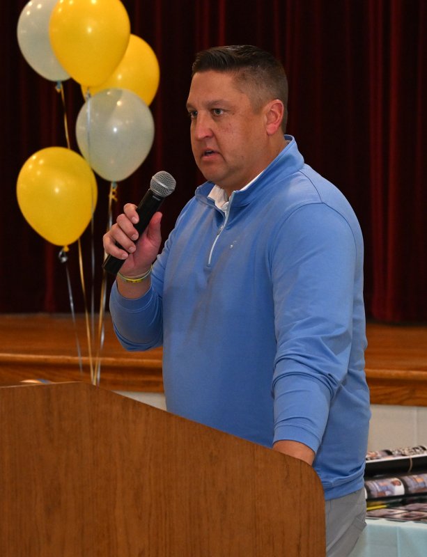 Varsity assistant coach Jason Pease speaks about the Captain Award.