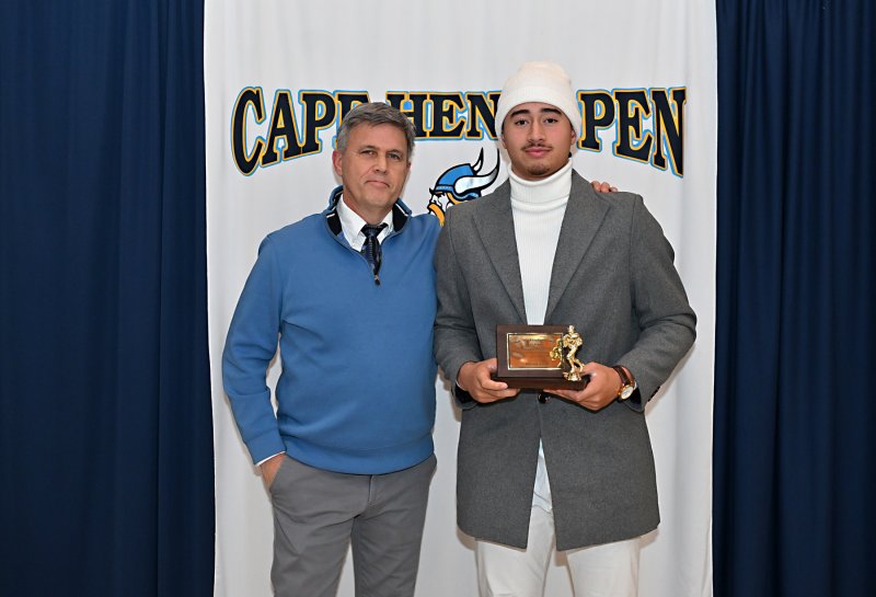 Cape coach Chip Knapp presents the team MVP Award to junior Jameson Tingle. Tingle passed for 1,567 yards, rushed for 699 yards and scored 25 touchdowns in 2025.