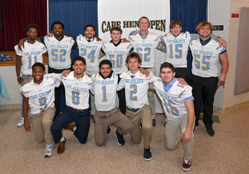 Members of the Cape Class of 2026 receive their jerseys as a gift from the football boosters. Shown in back are (l-r) David Barnes, Trey Batson, Quardell Richards, Robbie Payton, Liam Ramsey, Braden Wiswall and Mason Schaffer. In front are Navin Duffy, Tyrone Handy, Lamar McCoy, Mikey Thompson and Jamie Whitten. DAN COOK PHOTOS