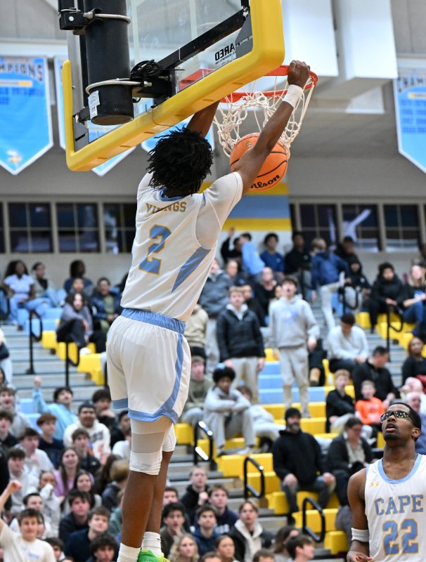 Geordan Downing jams one in the win over the Panthers. DAN COOK PHOTO