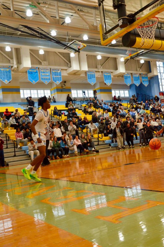 Vikings junior Geordan Downing got a standing ovation when he slammed one down. AARON R. MUSHRUSH PHOTO