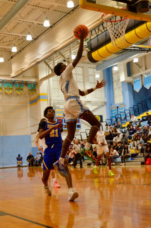 Cape junior Steve Sivels puts in two of his 13 points. AARON R. MUSHRUSH PHOTO