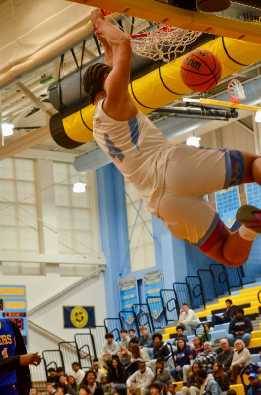 Vikings junior Jameson Tingle gets some hang time on this monster dunk to make sure he could land safely. AARON R. MUSHRUSH PHOTO