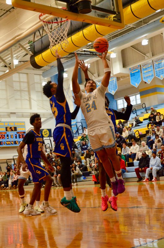 Cape senior Dell Richards puts in a pair of points. AARON R. MUSHRUSH PHOTO