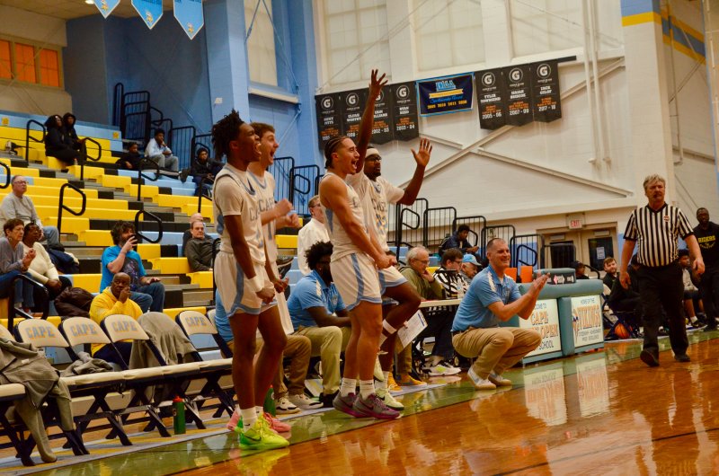 Four of the five starters were hyped when Lawson Whaley scored his first bucket of the game during the Vikings' 75-45 win over Caesar Rodney in a Monday Matinee Feb. 16. AARON R. MUSHRUSH PHOTO
