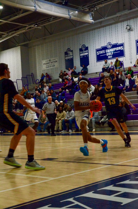 Sussex Academy sophomore Rico Nock takes a stroll on the end line.