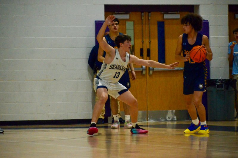 Sussex Academy senior Tate Sickler keeps his hands in the passing lanes.