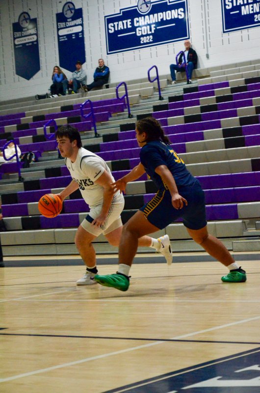 Sussex Academy sophomore Ty Jarrell drives inside.