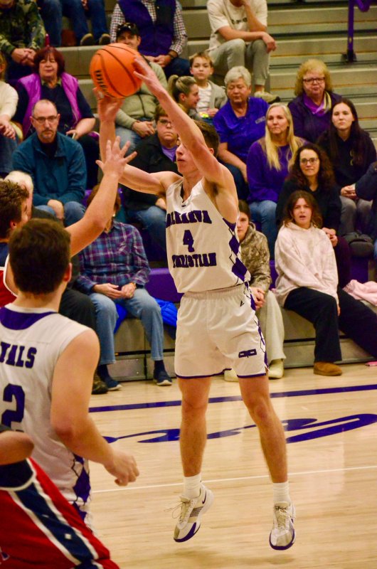 Delmarva Christian junior Landon Jackson pulls in a rebound.