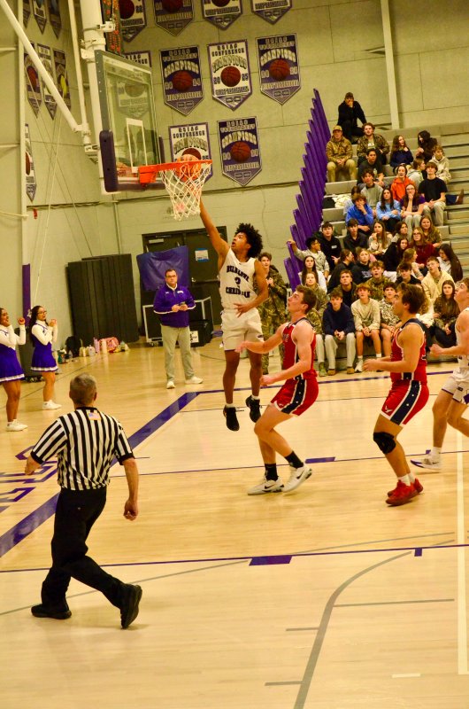 Royals sophomore Blake Dale finishes off a fast break.