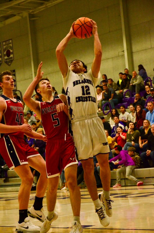 Delmarva Christian freshman Aarian Tucker goes up strong and keeps his hands clear.