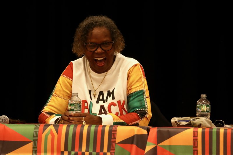 The Rev. Janet Maull-Martin laughs during one of the stories being told about life growing up on the Lewes playground.