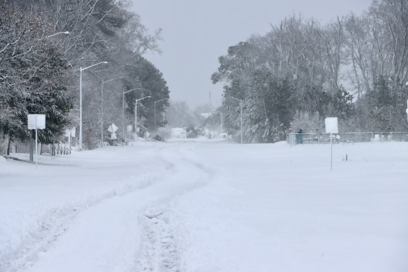 Looking down Hebron Road toward Church Street in Rehoboth Beach on Monday, Feb 23. Blowing snow added to the wintry scene on the trees. Snow drifts make it hard to measure snow amounts, with some places at more than a foot, while a short walk away there is very little.
BILL SHULL PHOTO
