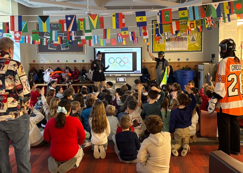 Milton Elementary second-grade teachers Julie DeLacy and Lauren Graves welcome students to the opening ceremony.