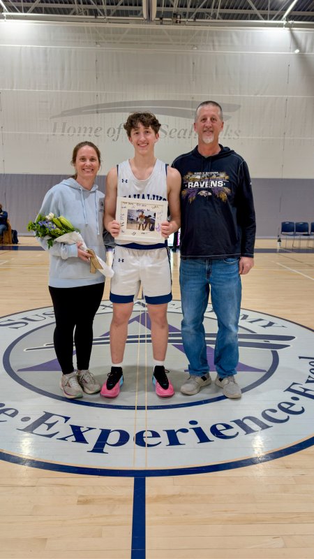 Sussex Academy senior Tate Sickler was honored with his mom Sarah and dad Derek.