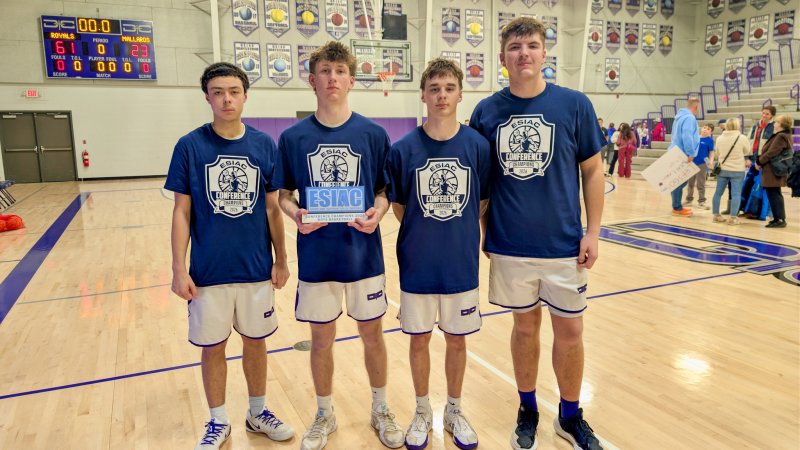 Royals freshman Aarian Tucker, far left, Noah Barbrow, left, Asher Woods, right, and Andrew Collins, far right, received ESIAC all-conference honors.