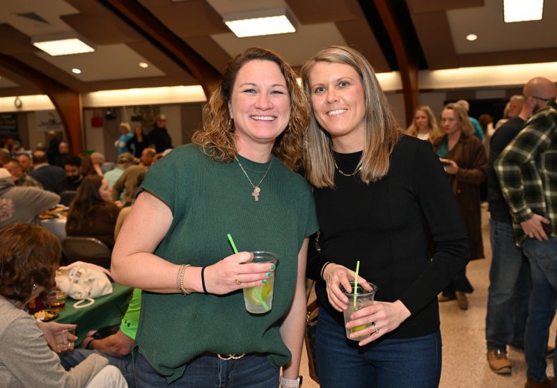 Ryan Ellis, left, and Ashley Bonk enjoy a libation and conversation at the event.