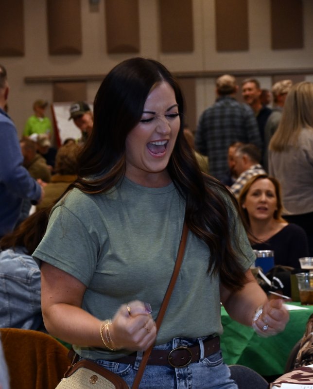 Jenna Hilovsky gets excited about her duck in the bucket throw.