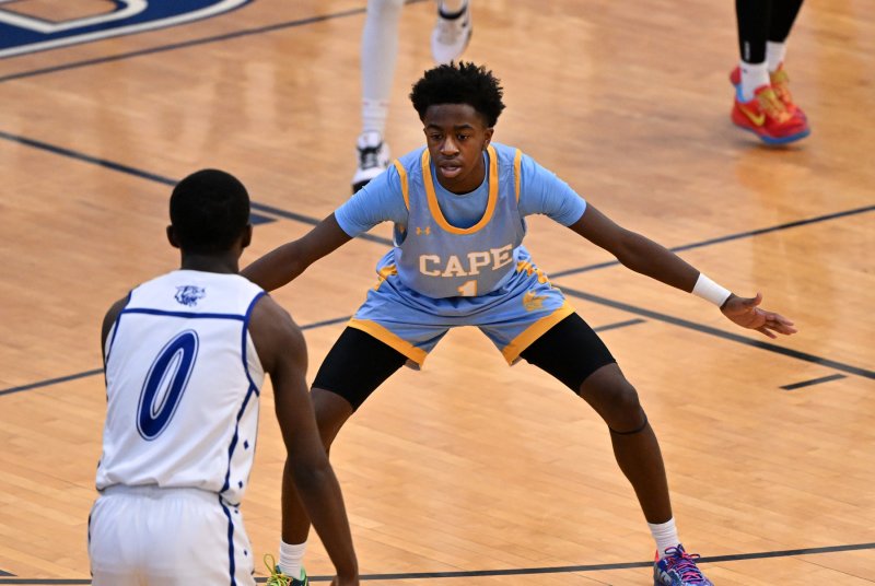 Junior guard Stephen Sivels plays tough defense on Howard’s Nicholas Baysah.