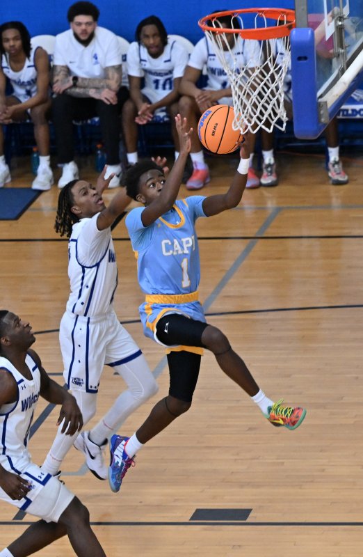 Cape junior Stephen Sivels blows past the Wildcats’ defense and lays in a deuce.