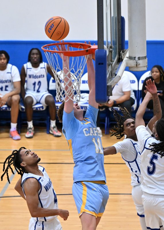 Senior Braxton Figgs powers from inside for the Vikings.