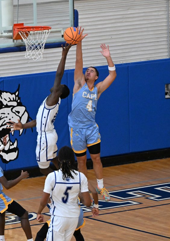 Jameson Tingle blocks the shot of Howard’s Nicholas Baysah.