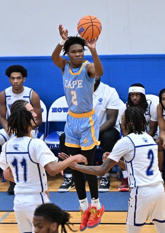 Cape junior Geordan Downing hits a three.