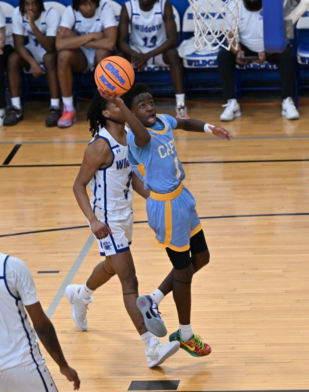 Stephen Sivels lays in for two of his 18 points.