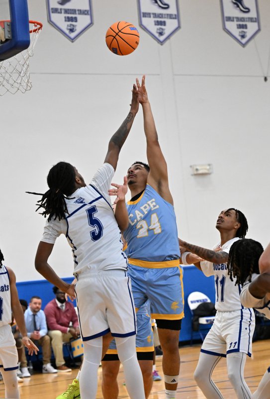 Dell Richards hits over Howard’s Dominic Awahmukalah.