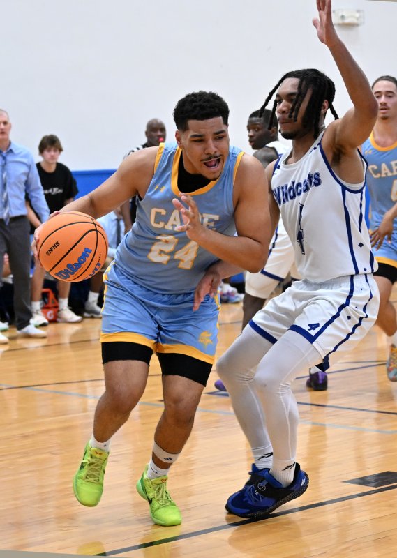 Dell Richards drives on Howard’s Bryson Lane.