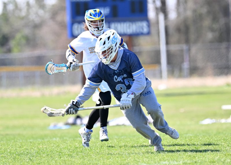 Sophomore Channing Smith scoops a ground ball.