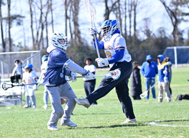 Cape junior Carter Nemcic scores past Central goalie Shane McCray.