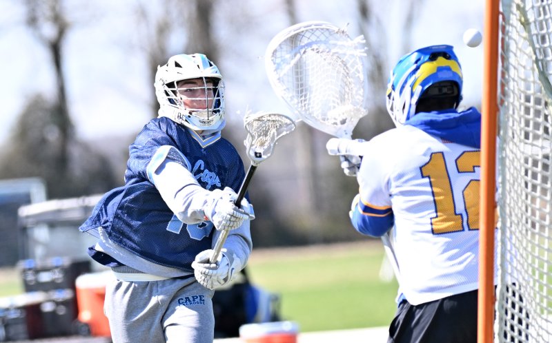 Senior Grant Conway shoots and scores past Central keeper Shane McCray.