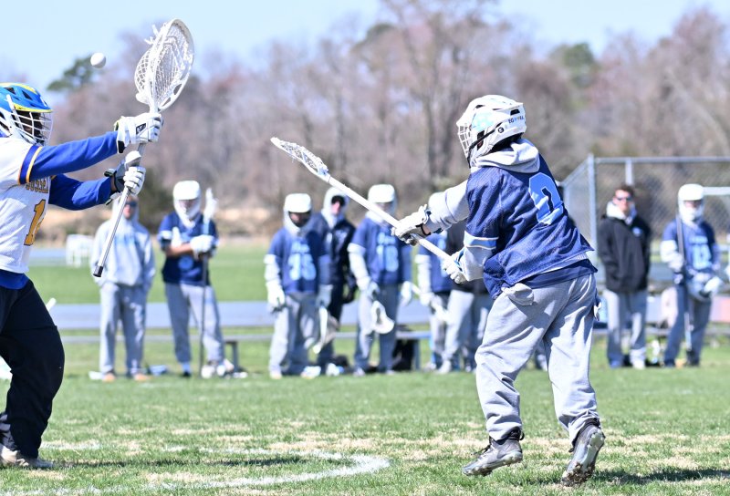 Senior Mathew Popovich shoots and scores for the Vikings.