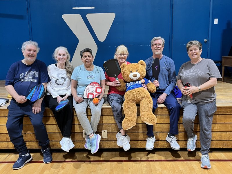 During his 2025 visit, Alex pops in to play pickleball with Sussex Family YMCA members. Shown are (l-r) Mark Zaffarano, Marlene Davis, Ruth DSylva, Patti Dumas, Mike Mulligan and Juliana Vantol. FILE PHOTO